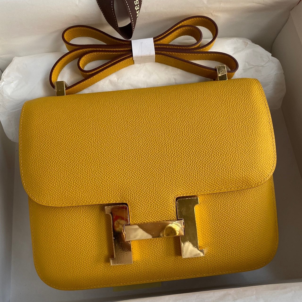 H**mes constance 24 handmade bag in jaune ambre epsom calfskin